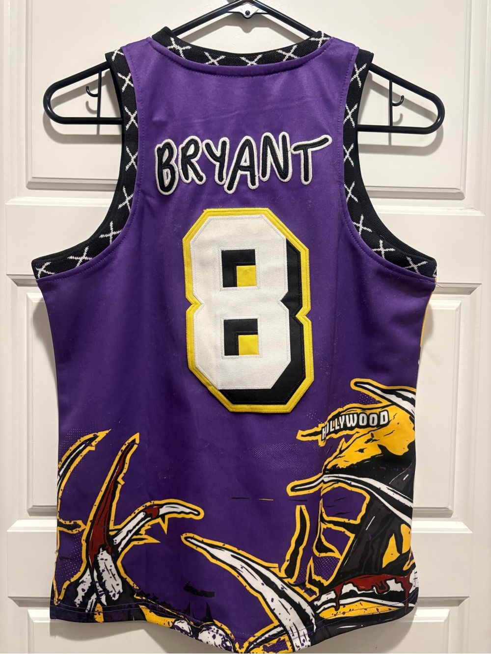 Brand X Los Angeles Kobe Bryant #8 Purple Jersey, youth Medium.